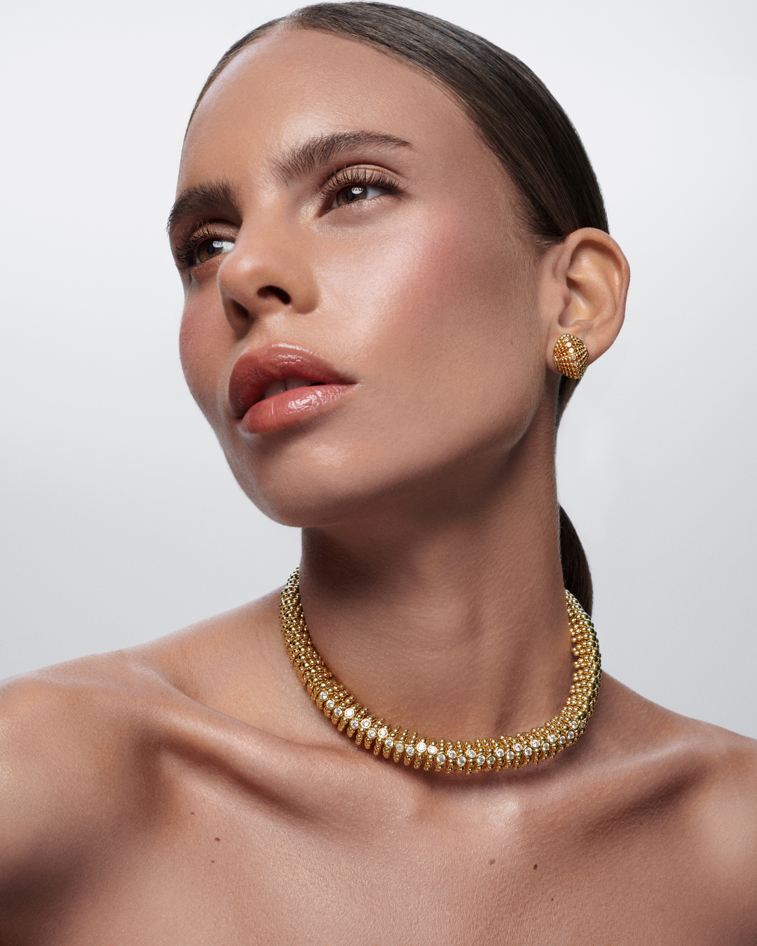 Ravi Lune gold necklace paired perfectly with Lune Stud Earrings