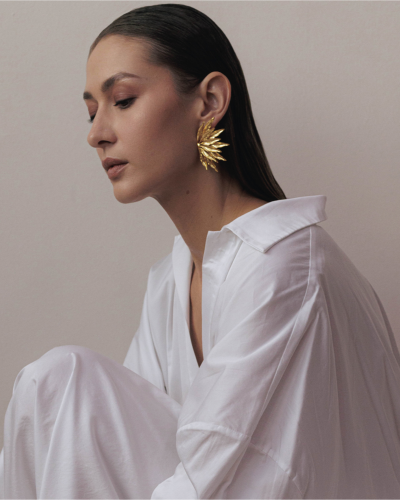 Bold gold flower earrings with lightweight feel