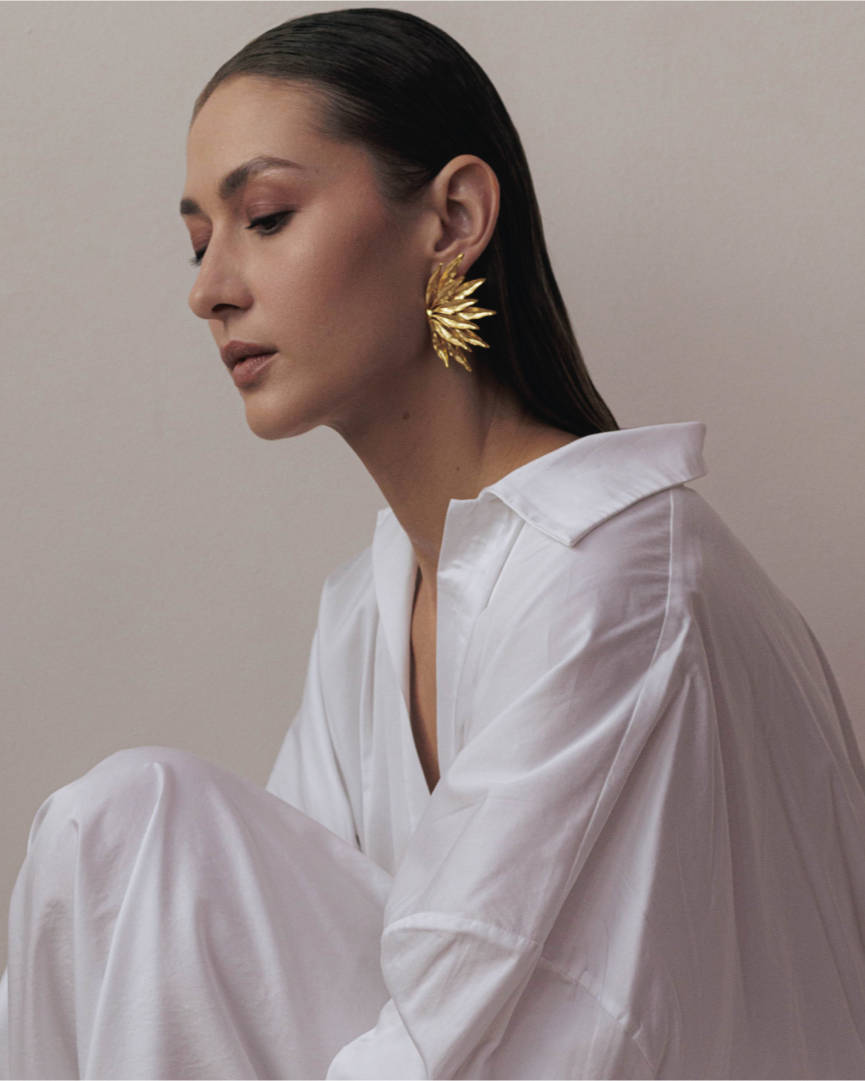 Bold gold flower earrings with lightweight feel