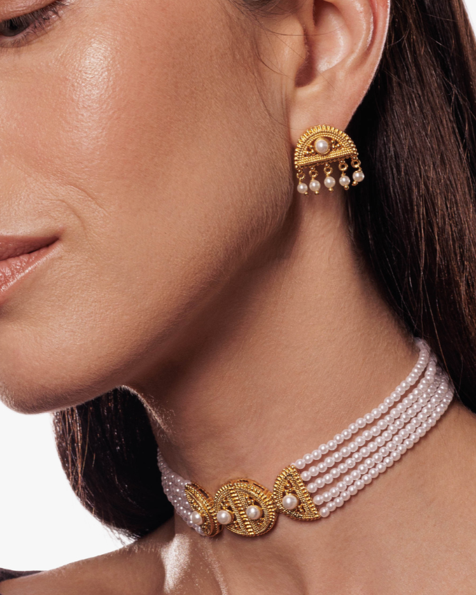 Close-up of 24k gold-plated Ravi Hemisphere Earrings