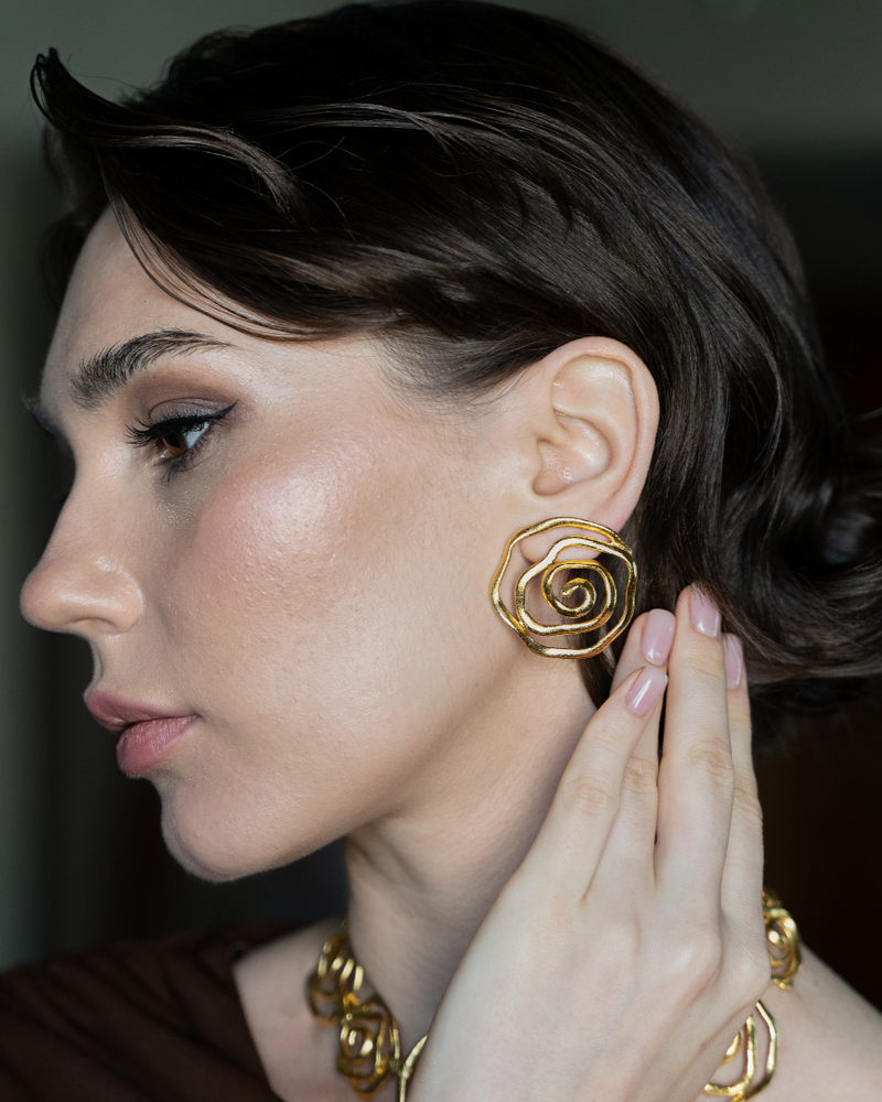 Gold swirl earrings for casual or formal wear