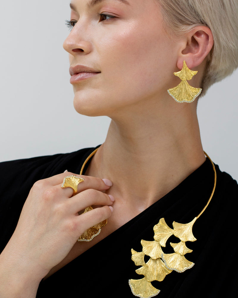 Elegant gold earrings with sparkle detail