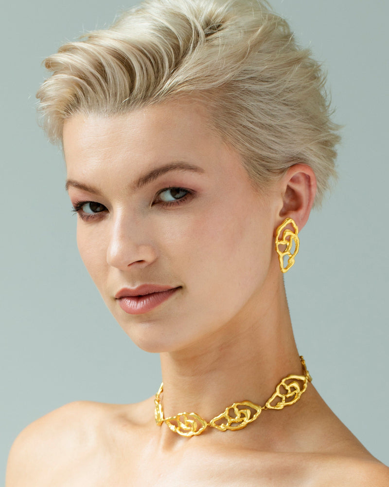 Sculpted gold abstract earrings for confident style