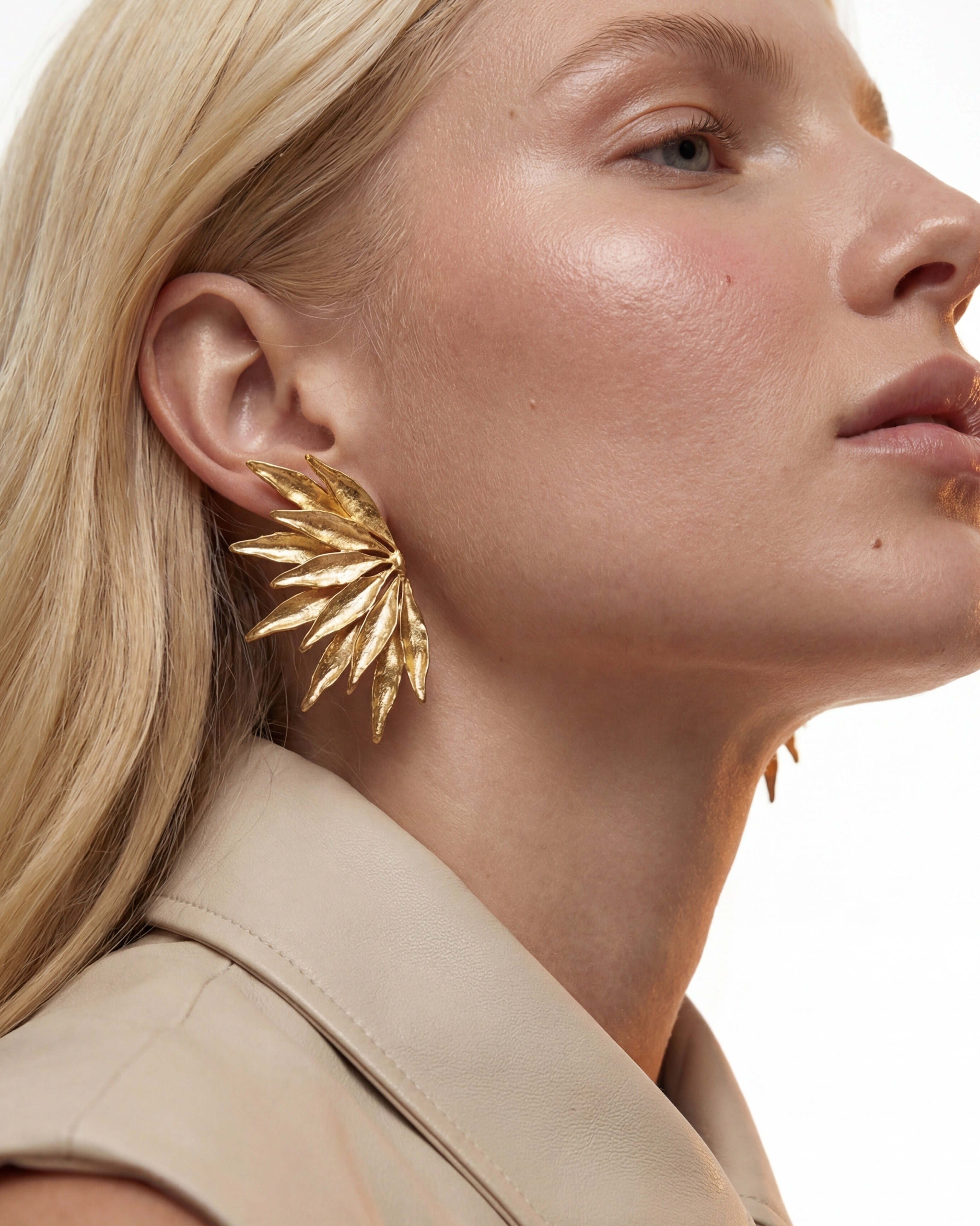 Bold gold flower earrings with lightweight feel