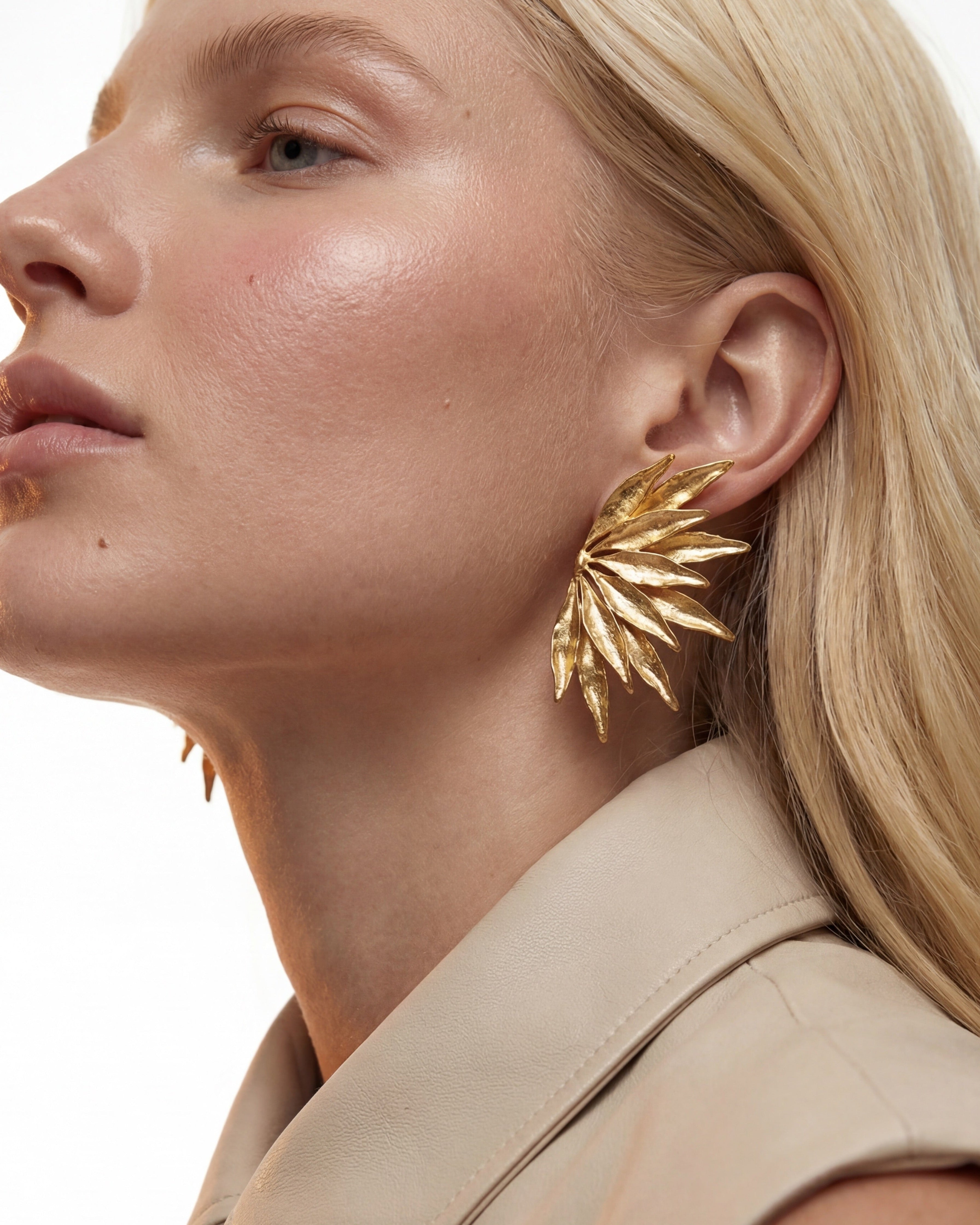 Bold gold flower earrings with lightweight feel