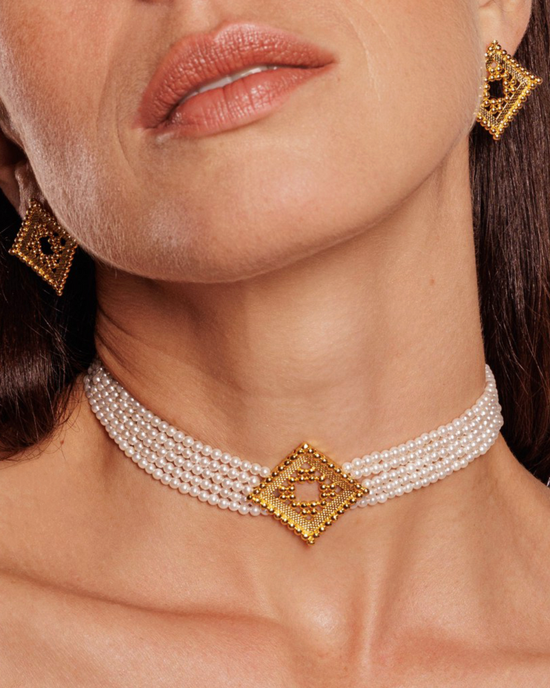 Lightweight beaded gold earrings with pearl details