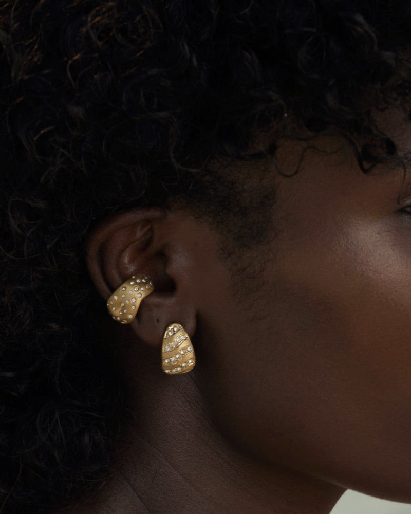 Elegant gold-plated earcuff designed to stack with earrings