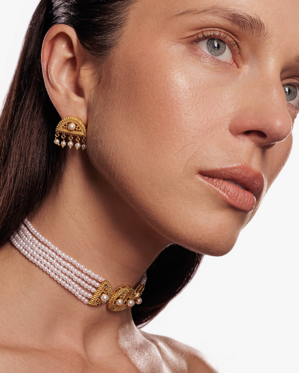 Lightweight golden statement earrings with traditional beading