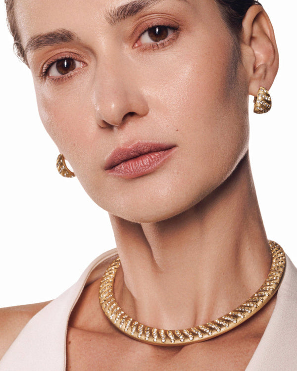 Aurora Wave hoops styled as statement gold earrings