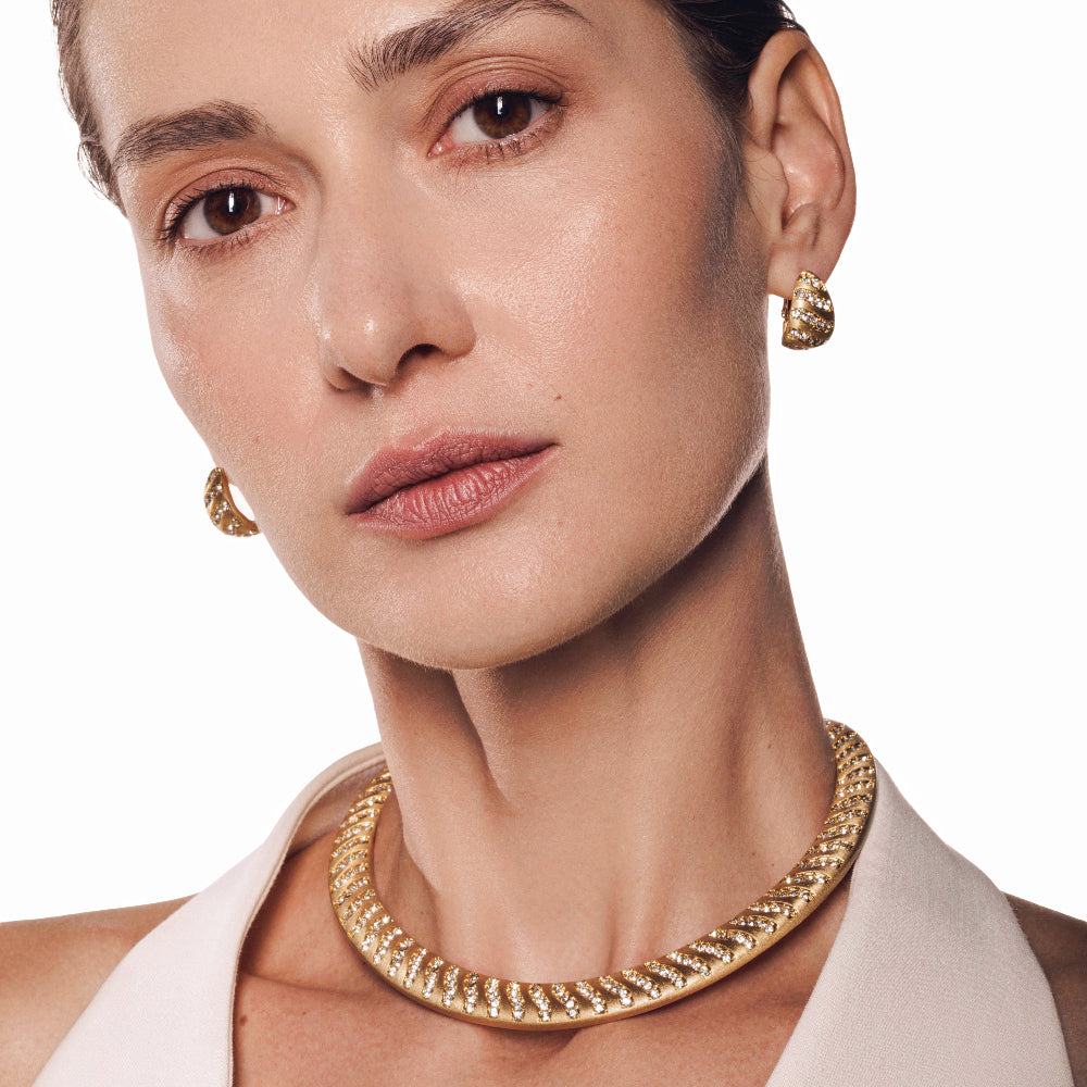 chunky gold plated collar necklace with zirconia studs with matching earrings