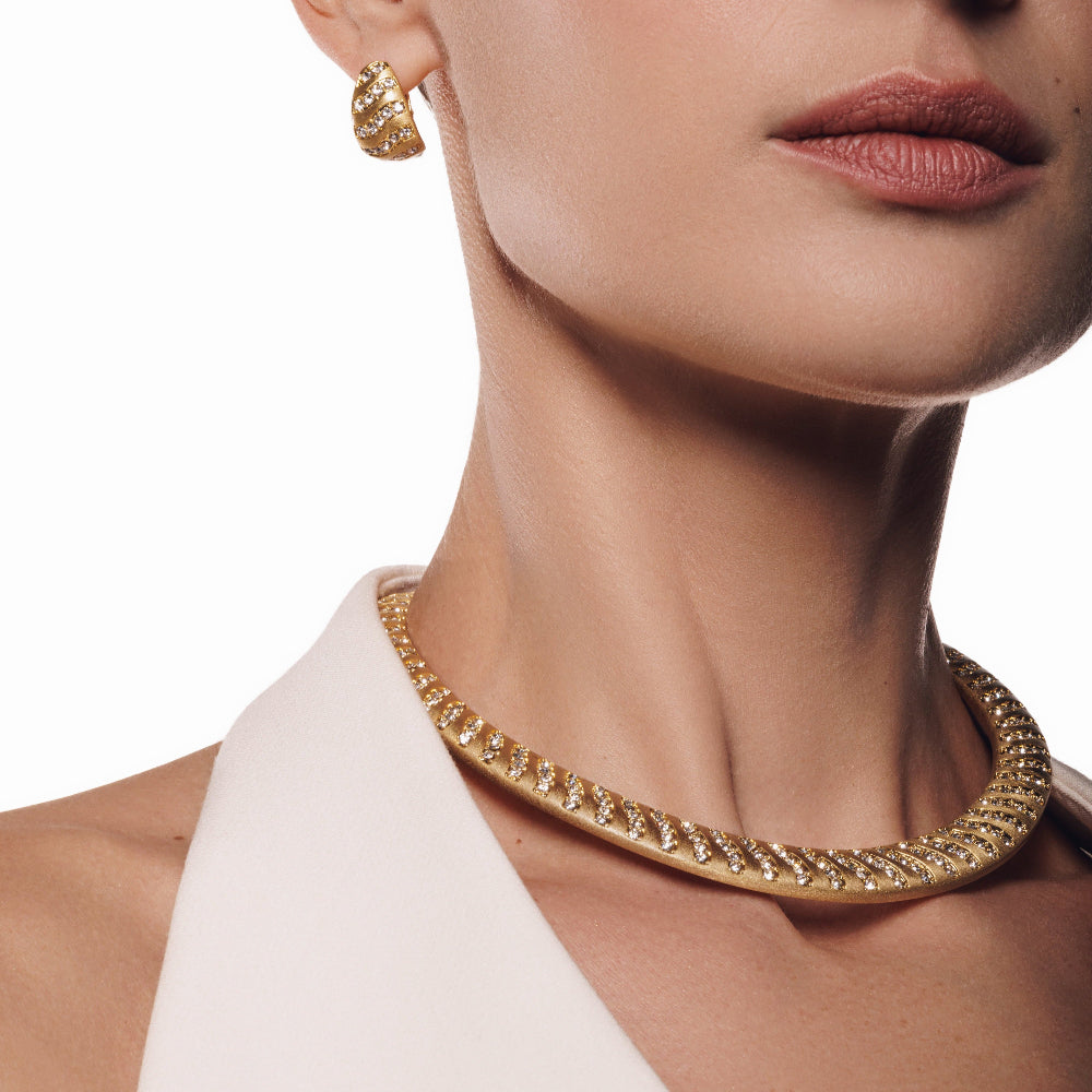 chunky gold plated collar necklace with striped zirconia studs