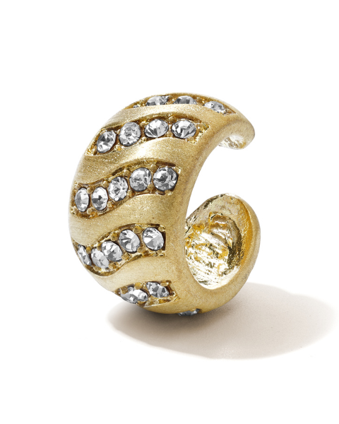 Gold-plated Aurora Wave Earcuff styled for a modern ear stack look