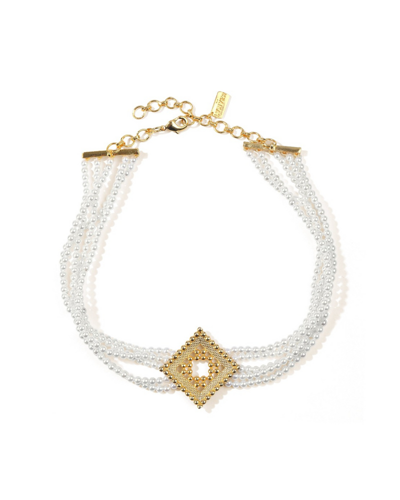 Indian-inspired gold earrings with freshwater pearls