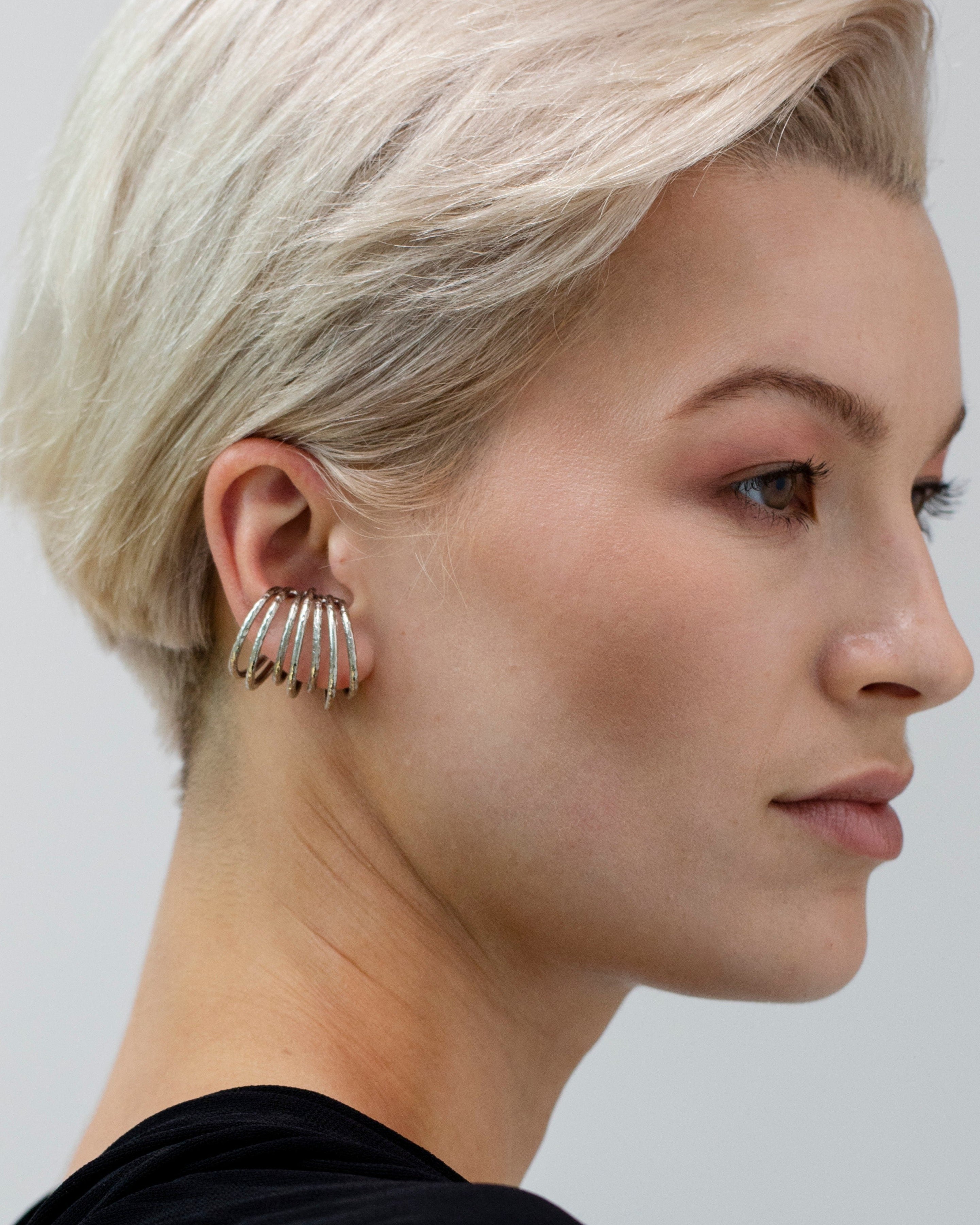 Sculptural silver ear wrap with organic texture