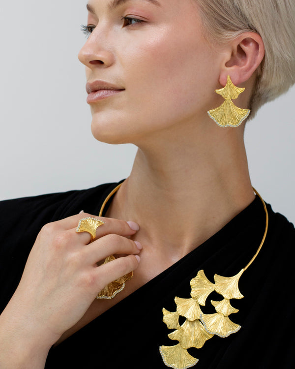 Elegant gold earrings with sparkle detail