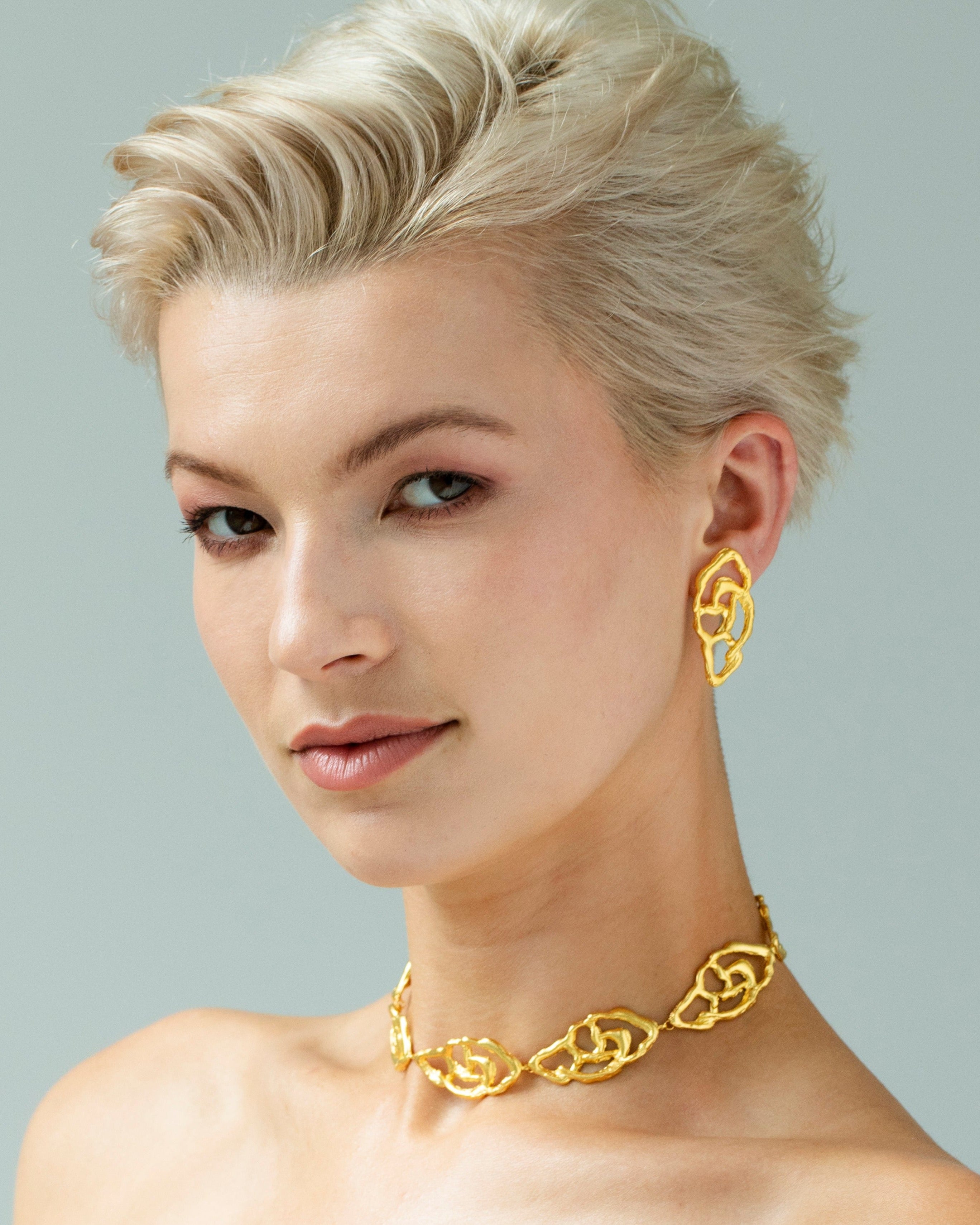 Sculpted gold abstract earrings for confident style