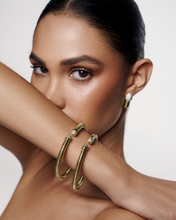 Minimalist serpent-style bracelet with a sleek coiled silhouette