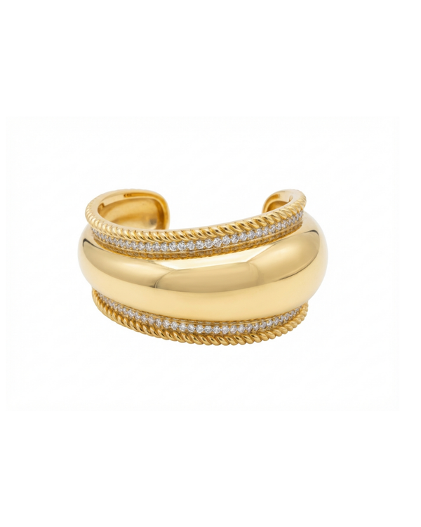 Gold bracelet with diamond accents on a white background