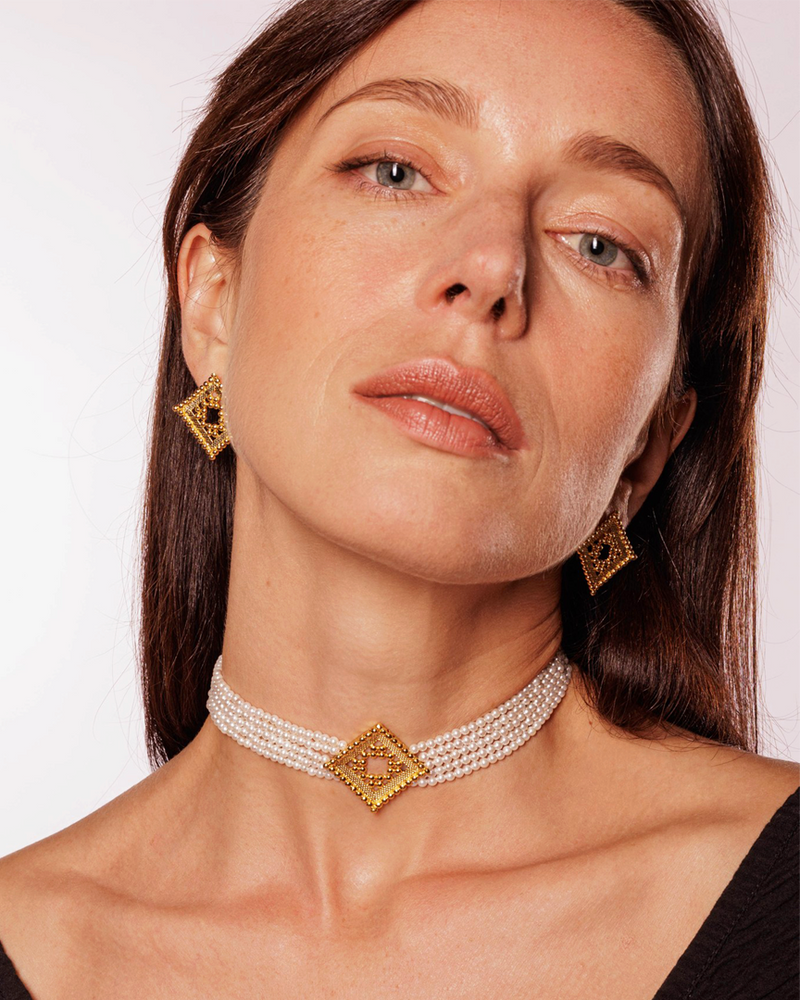 Ravi Hemisphere Earrings featuring intricate pearl accents