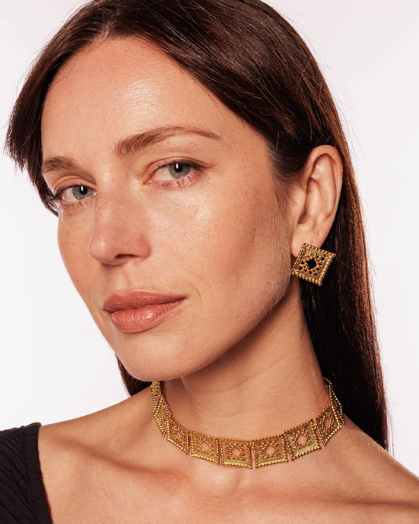 Elegant beaded gold earrings with heritage design