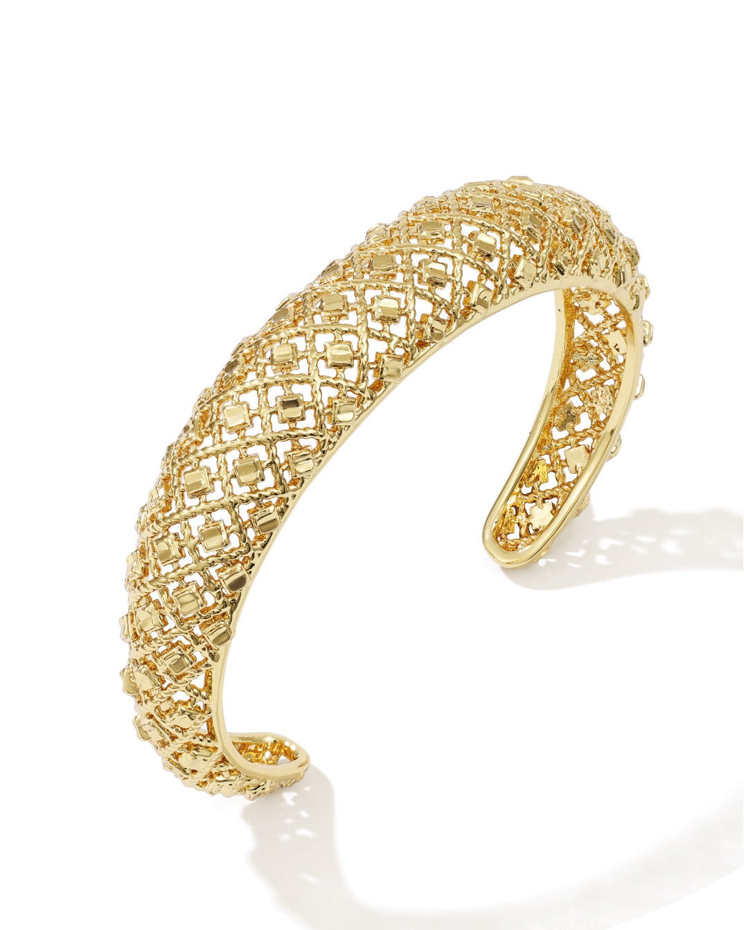 Gold statement weave bangle with design accents