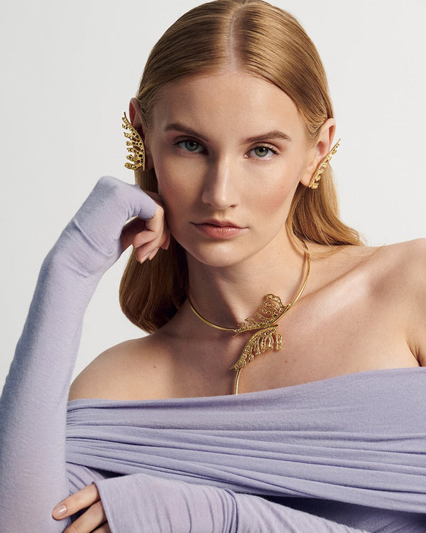 Adjustable gold collar necklace with 24k gold plating, featuring a nature-inspired design—ideal for layering or wearing solo as a bold statement piece.