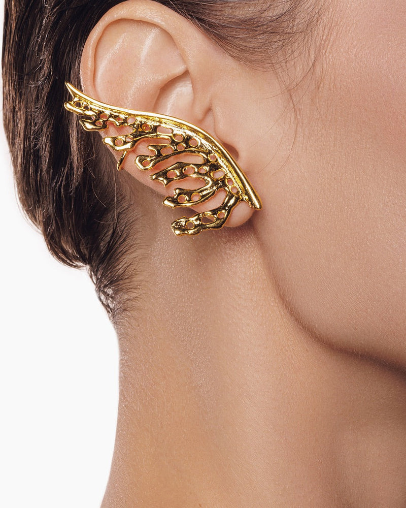 Gold leaf-shaped ear cuff, handcrafted with elegant detail—perfect for everyday wear or as a whimsical bridal accessory.
