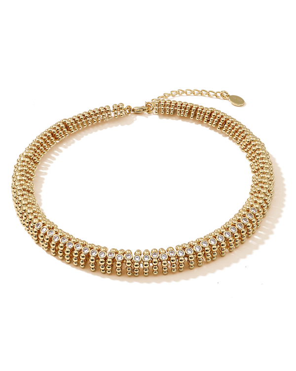 Delicate gold fashion necklace that exudes confidence and control