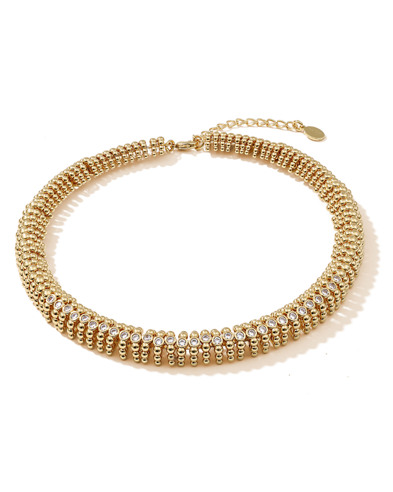 Delicate gold fashion necklace that exudes confidence and control