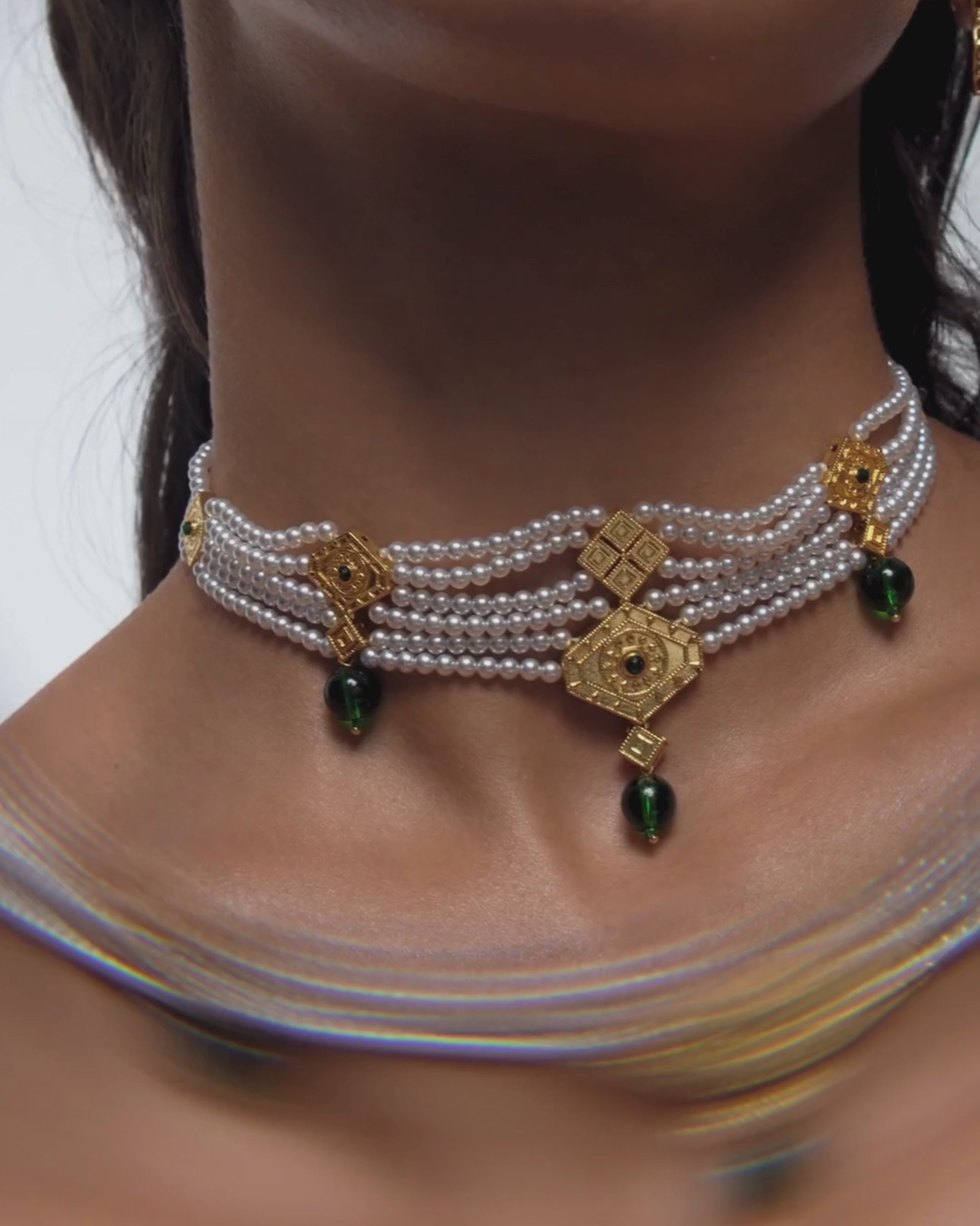 Arab-inspired gold drop earrings & and pearl necklace