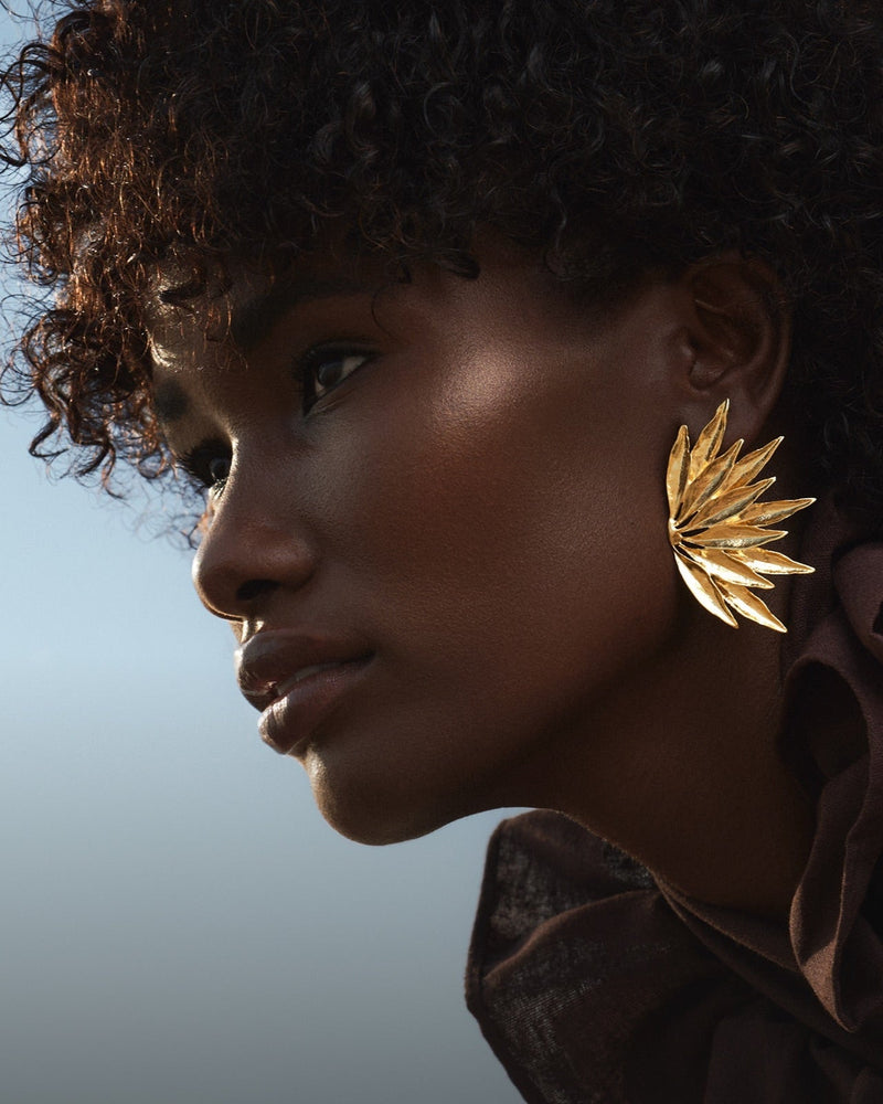 Large yet comfortable gold earrings