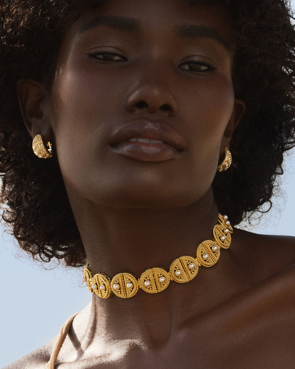 Elegant gold choker handcrafted using Rava technique